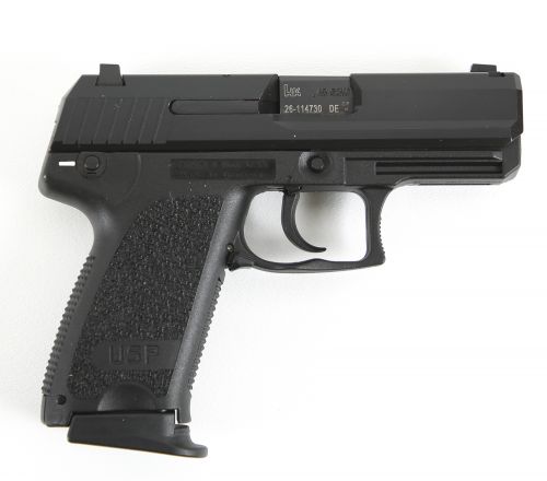 Heckler & Koch H&K USP Compact V1 40 S&W Caliber with 3.58 Barrel, 12+1 Capacity, Overall Black Finish, Serrated Trigger Guard